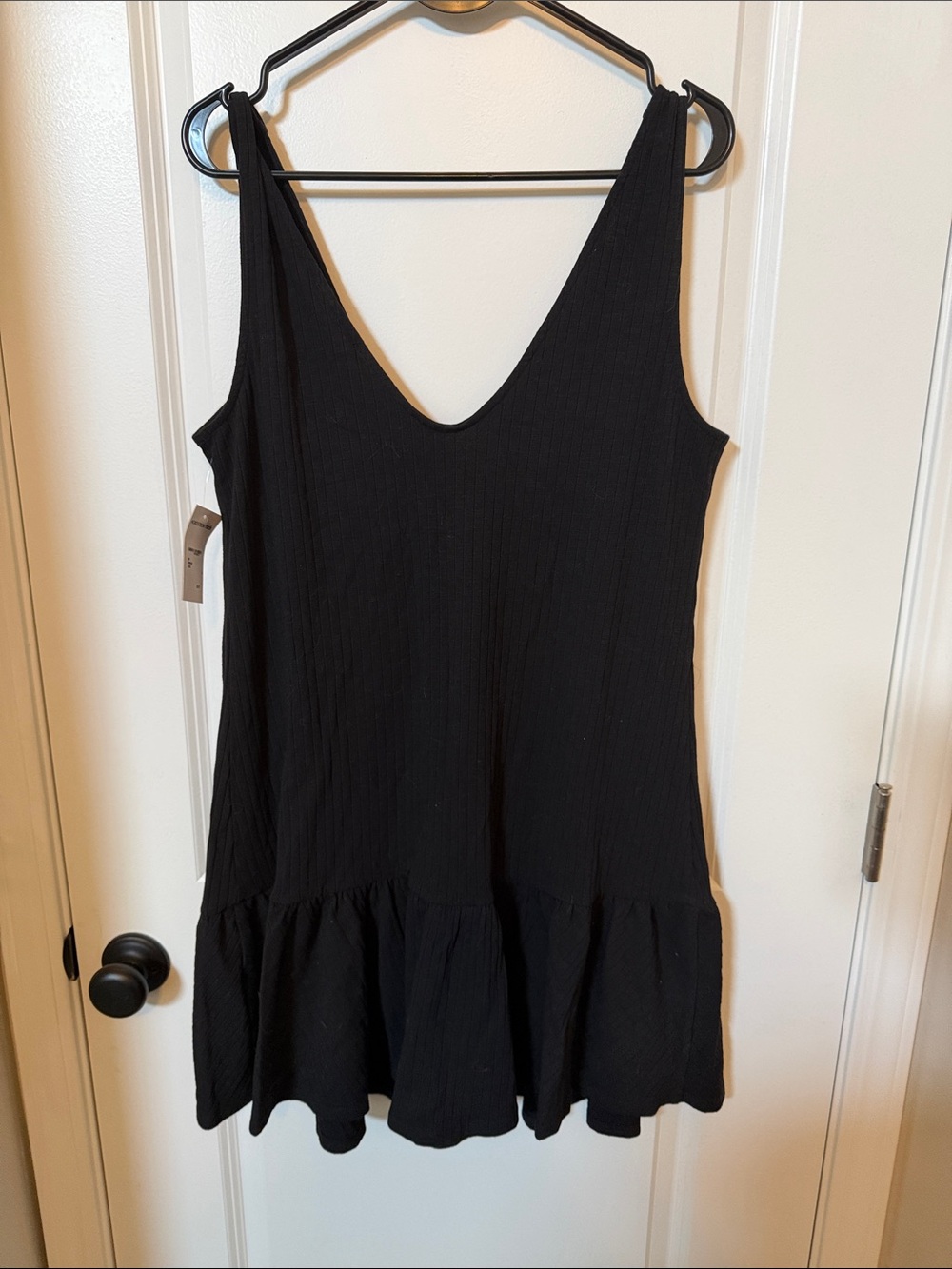 Elodie Black Ribbed Sleeveless Mini Dress with Flounce Hem - Picture 3 of 5